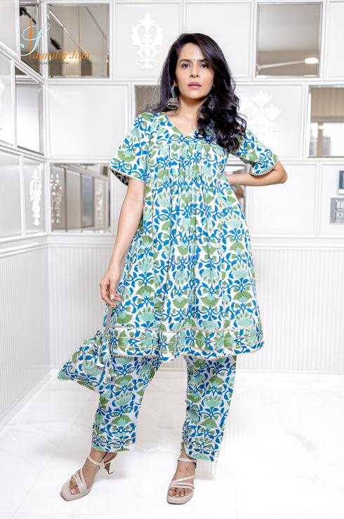 FLORAL SALWAR SUIT WITH POTLI