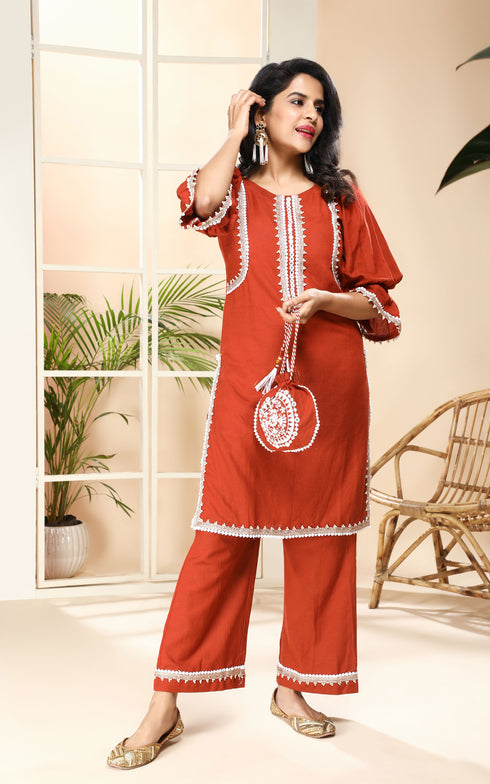 BROWN KURTA/PANT WITH POTLI